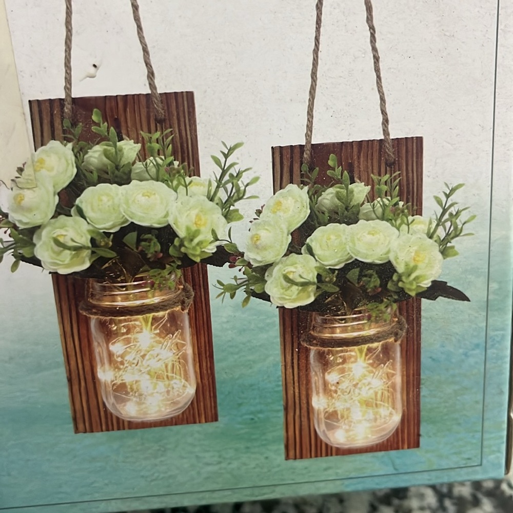 Warm Mason Jar Sconces with White and Green Accents